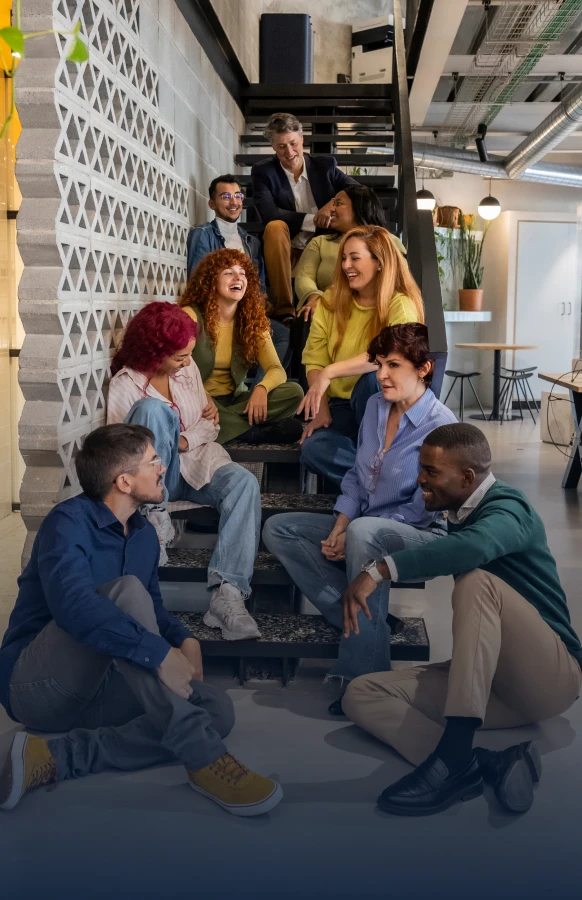 Colleagues chatting on staircase