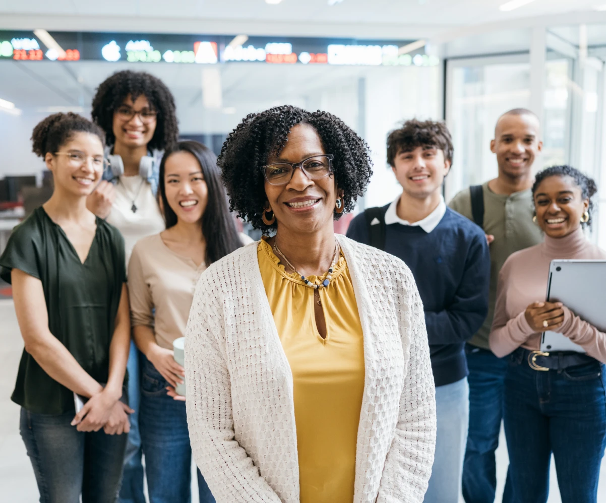 Colleagues posing in modern workspace